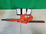 electric Black and Decker hedge trimmer