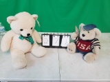 2 teddy bears 1 sings God Bless America