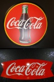 Two Coca-Cola Signs