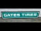 NOS Embossed Gates Tires Sign