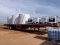 SEMI FLAT BED TRAILER RIGGED W/ FERTILIZER TANKS