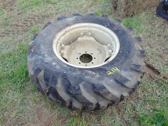 Firestone 14.2-24 tractor tire on 8 lug rim