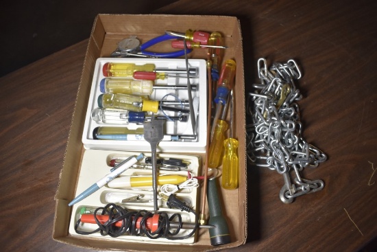 Screwdrivers, testing lights, 1 1/4" wood bore bit, chain with clasp and nut drivers
