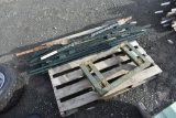 pallet with 13 t-posts and metal dolly cart