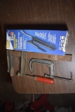 New General Purpose Grease gun in box and c-clamp and material clamp