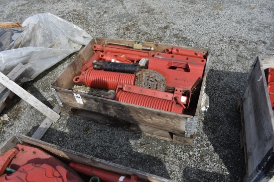 Box with Kvernland Springs, Shields, connector plates, and hydraulic cylinders