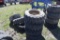 4 10-16.5 skidsteer tires on 8 lug rims along with 3 misc tires