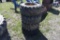 4 12-16.5 skidsteer tires on 8 lug rims