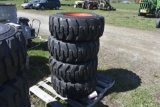New Forerunner 12-16.5 skidsteer tires on 8 lug rims