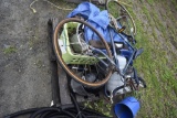 Pallet with Bike, 2 motorcycle helmests, wheel barrow whee, electric motor, etc