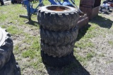 4 12-16.5 skidsteer tires on 8 lug rims