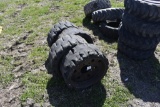 Group of 4 run flat skidsteer tires