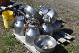 7 Milking pales with 2 strainers on pallet
