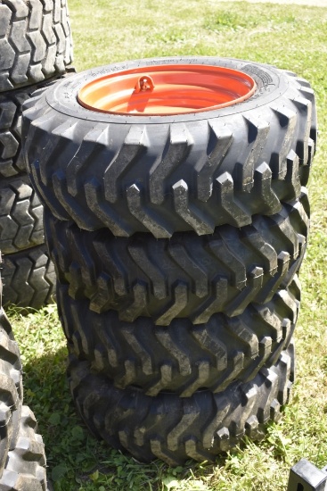 Camso 10-16.5 Skid Steer Tires on 8 Lug Rims