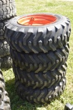 Camso 10-16.5 Skid Steer Tires on 8 Lug Rims