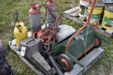 Pallet with 4 sprayers, scaffold jack, scotts spreader, blower, and craftsman chainsaw