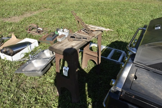 work bench with old scaffold jacks