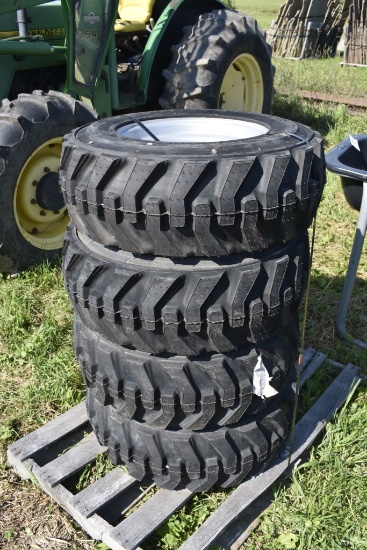 4 New Titan 10-16.5 skidsteer tires