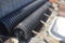 section of black plasic drainage pipe