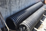 section of black plasic drainage pipe