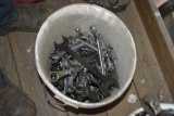 pale of wrenches, crescent wrenches, c-clamps, etc
