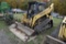 Komatsu CK 35 Skid steer with Tracks