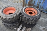 4 Bobcat 31x12-16.5 Skidsteer tires with 8 lug rims