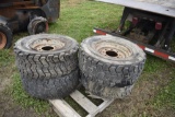 Set of 4 12-16.5 Skidsteer tires on 8 lug rims