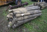 35 Round Wooden posts mostly 6 1/2' long
