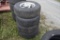 4 Goodyear P235/75 R15 Tires on Chevy Rims