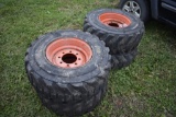 Set of 4 DeeStone 12-16.5 NHS loader tires with 8 lug rims