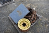 Pallet with post hole auger, rims, cultivator teeth, hitch parts, etc