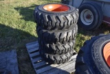 4 new Forerunner 10-16.5 Skidsteer tires on 8 lug orange rims