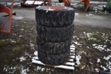 4 12-16.5 Skidsteer tires on 8 lug bobcat rims