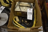 Box with Dayton 10 Amp Battery Charger, extension cords, bungie cords