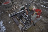 Pallet with Lawn Mower wheel lift, ice auger, weedwhacker, misc hardware, etc
