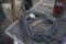4 Plug 120 Volt extension cord and rock rake, mop and leaf rake