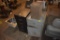black 2 drawer filing cabinet, blue cabinet, and bin of baking soda