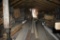 contents of upstairs of barn close to woods