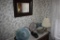 Group of dishes and small wall mirror
