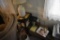 Table, light, group of books, and foot stool