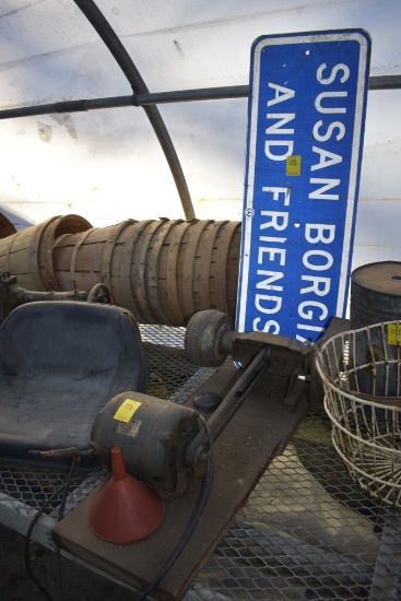 Electric powered grinder and road sign