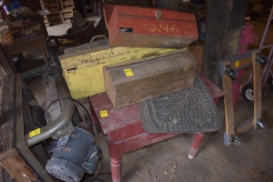 Red Table that needs work with 4 assorted tool boxes with some misc contents
