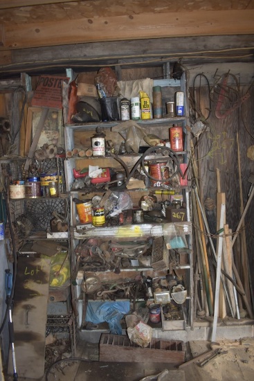 Contents of two shelves and on wall