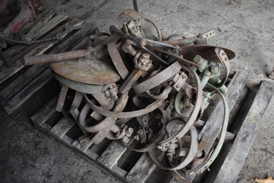 Pallet of John deere cultivator parts