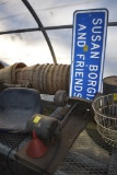 Electric powered grinder and road sign