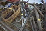Pennzoil pump, grease barrel pump and basket with some tools in it