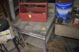 little wooden table, red wooden carryall and vegetable poster