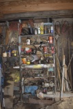 Contents of two shelves and on wall