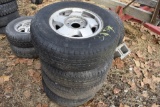 set of 4 Dunlop P265/70R16 Tires on 6 lug aluminum Rims